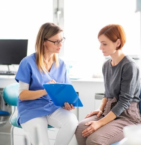 Dentist consulting a patient